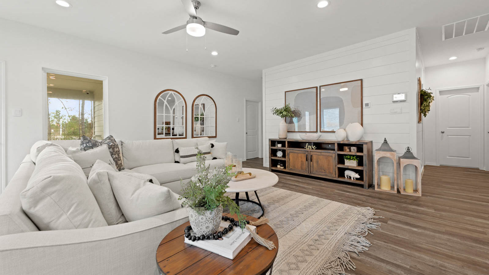living room with bright windodws