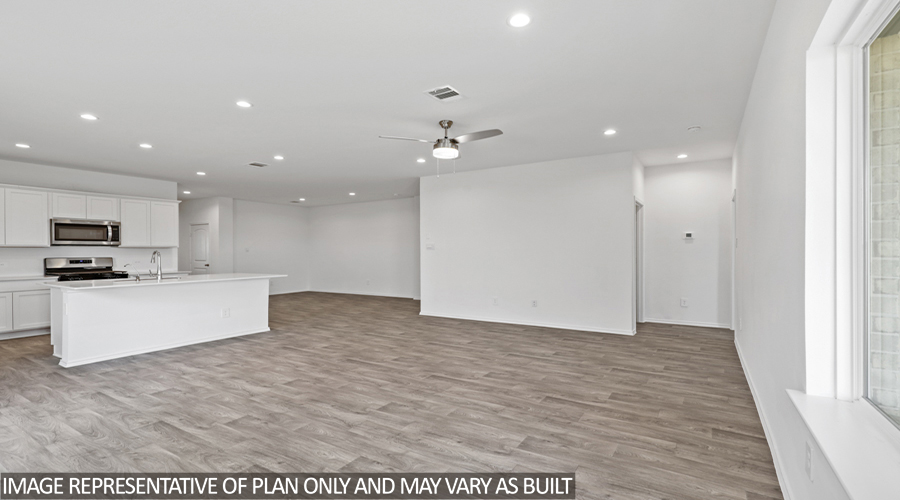 Open-concept living and dining space.