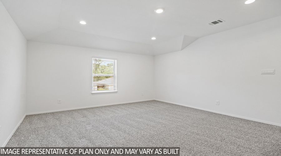Upstairs game room with carpet flooring.