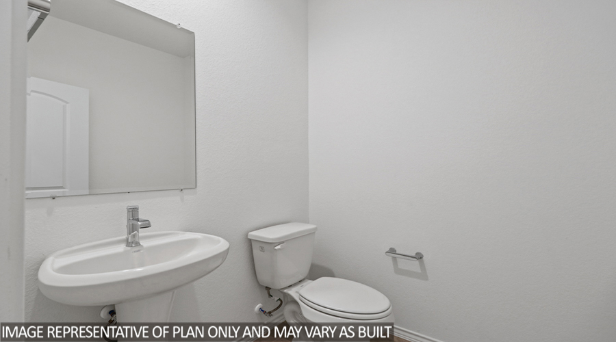Powder room with pedestal sink.