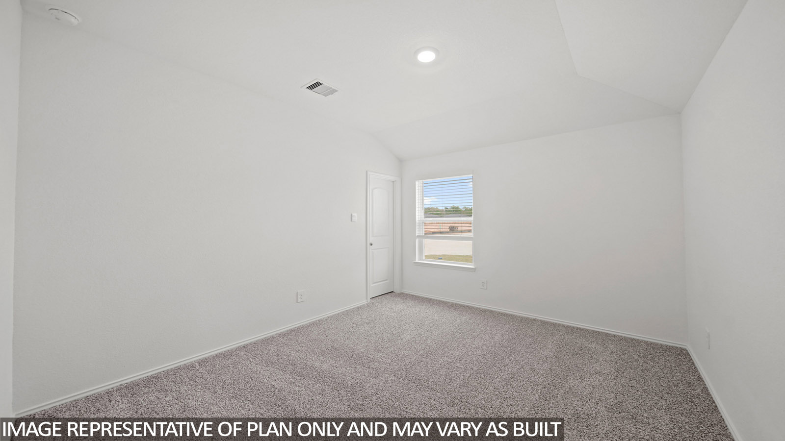 secondary bedroom with carpet flooring