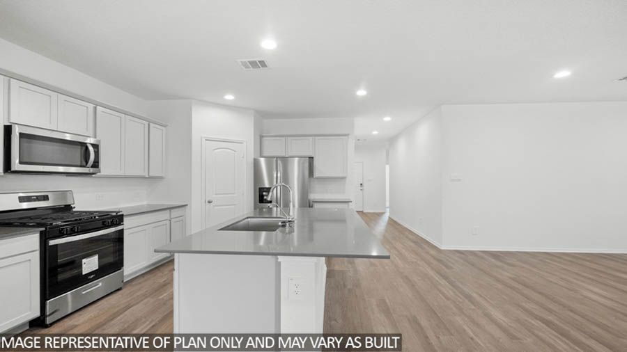 Open concept living, dining, and kitchen area