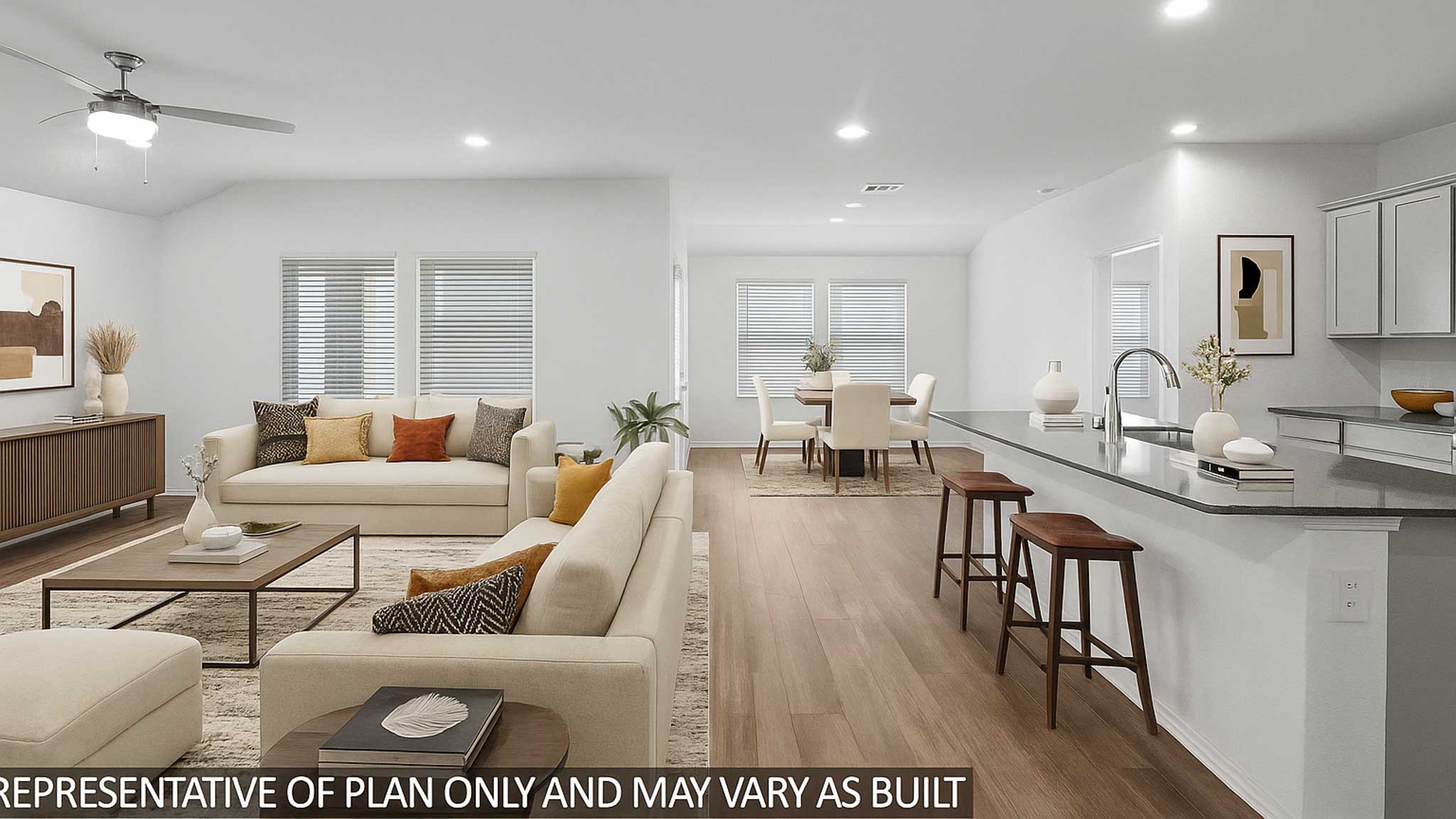 Staged open concept living and dining space with vinyl flooring and bright windows.