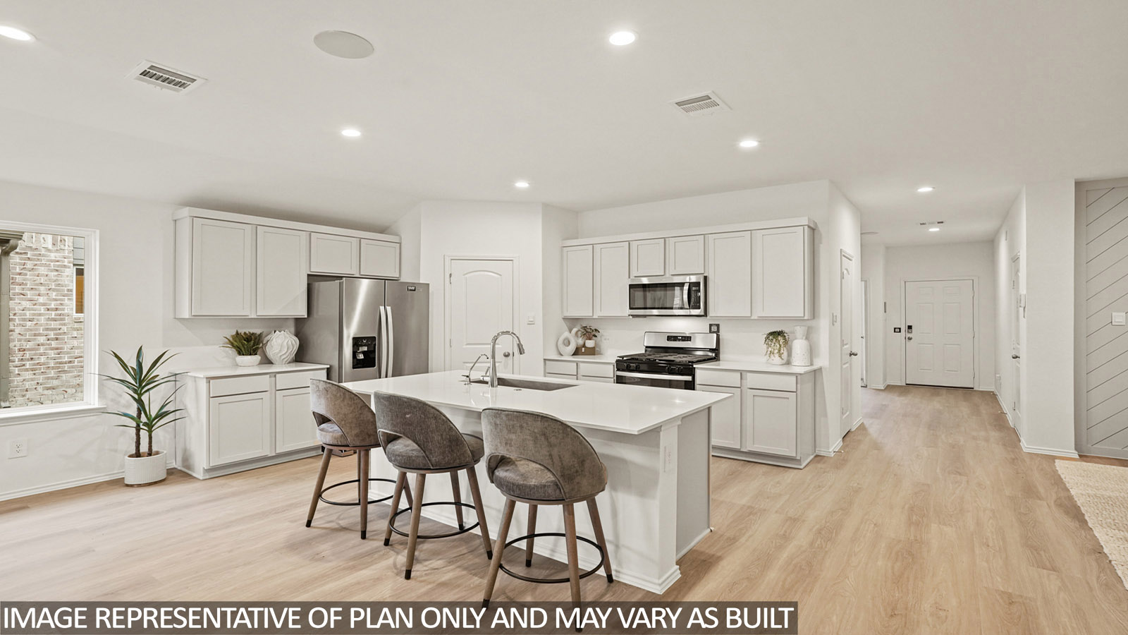 L- shaped kitchen with an island