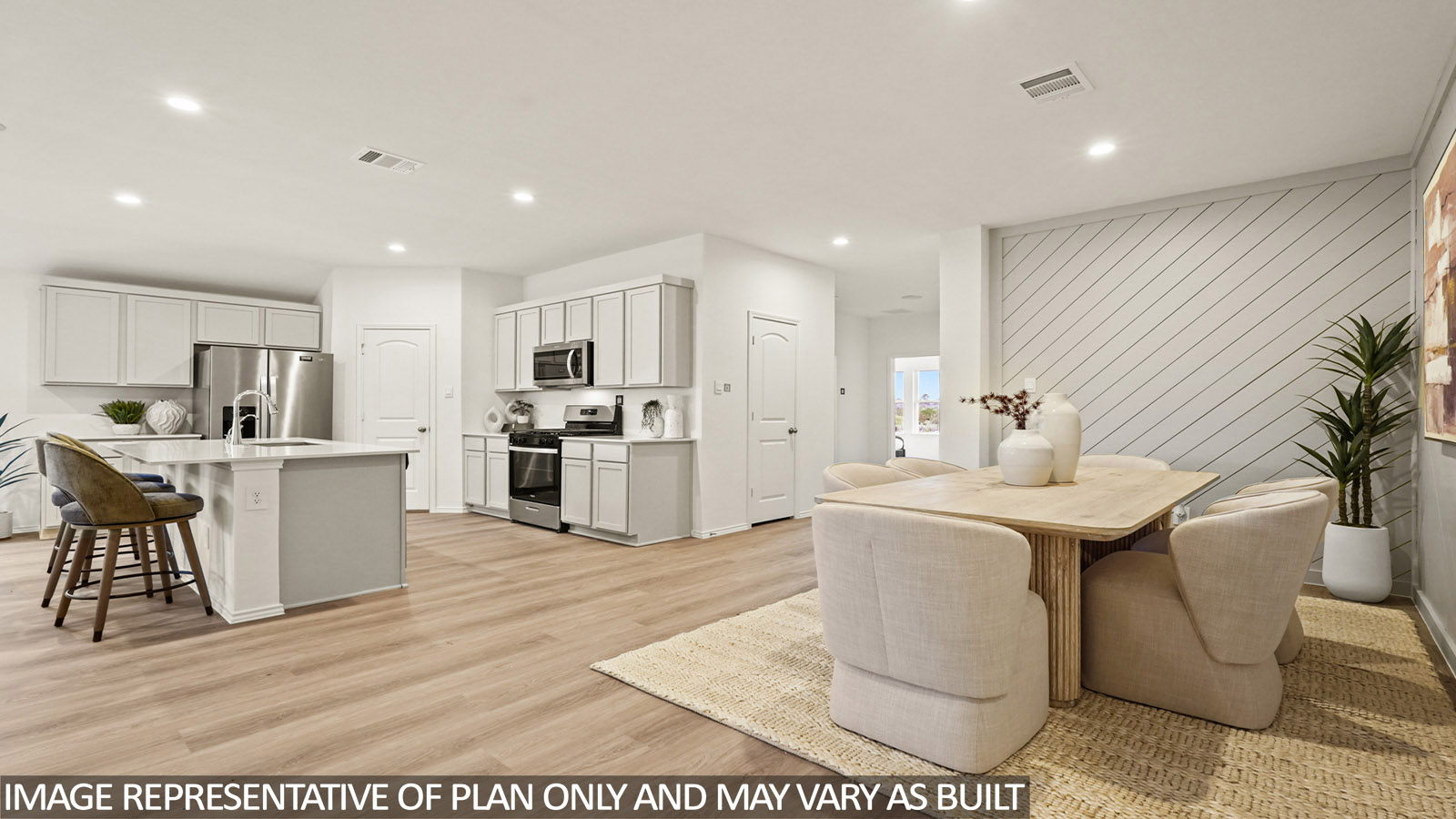 Open concept living, dining, and kitchen area