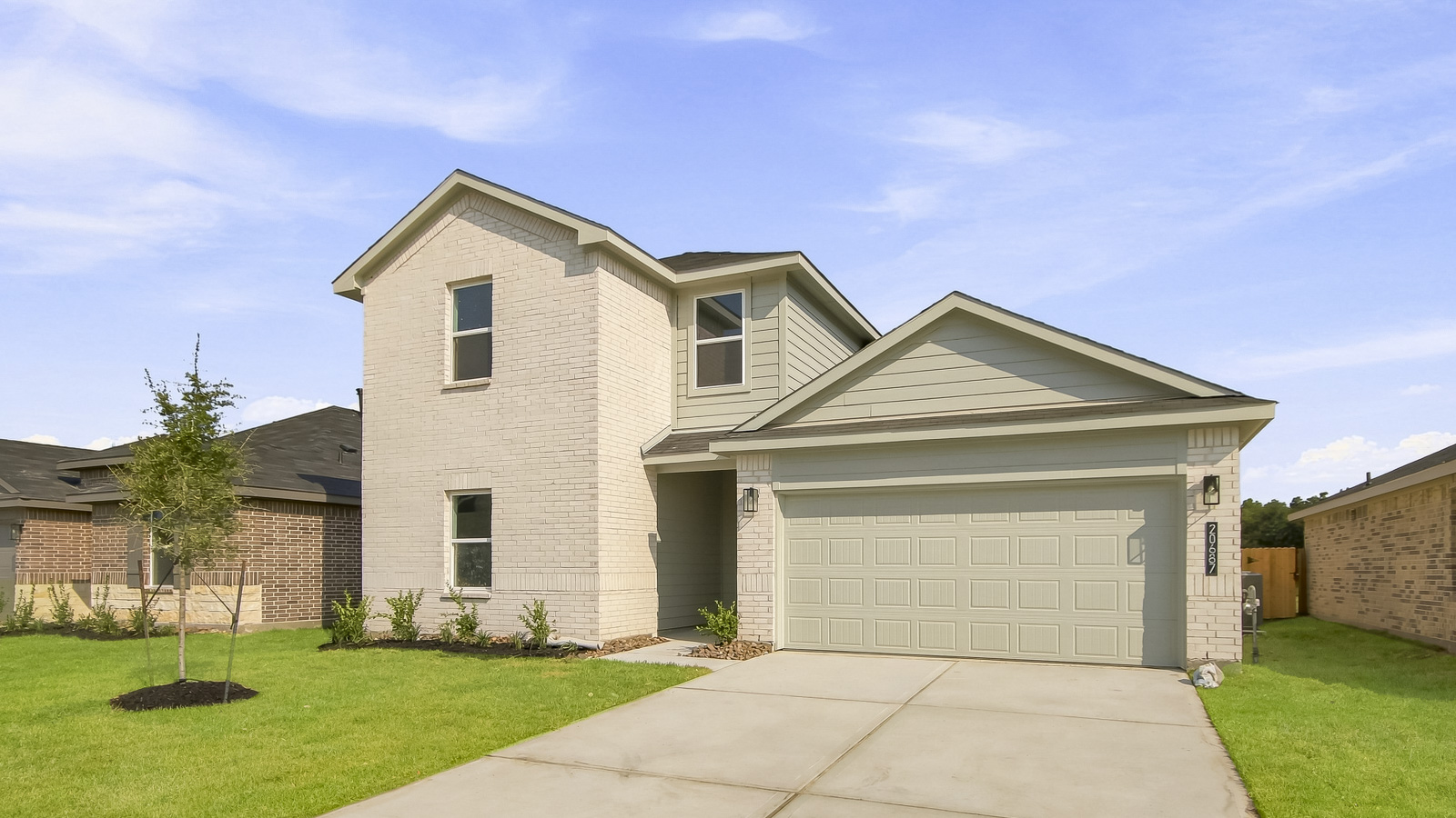 Two story home with two car garage