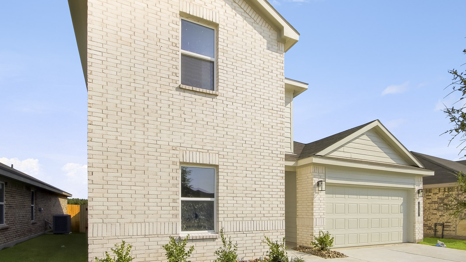 Two story home with two car garage