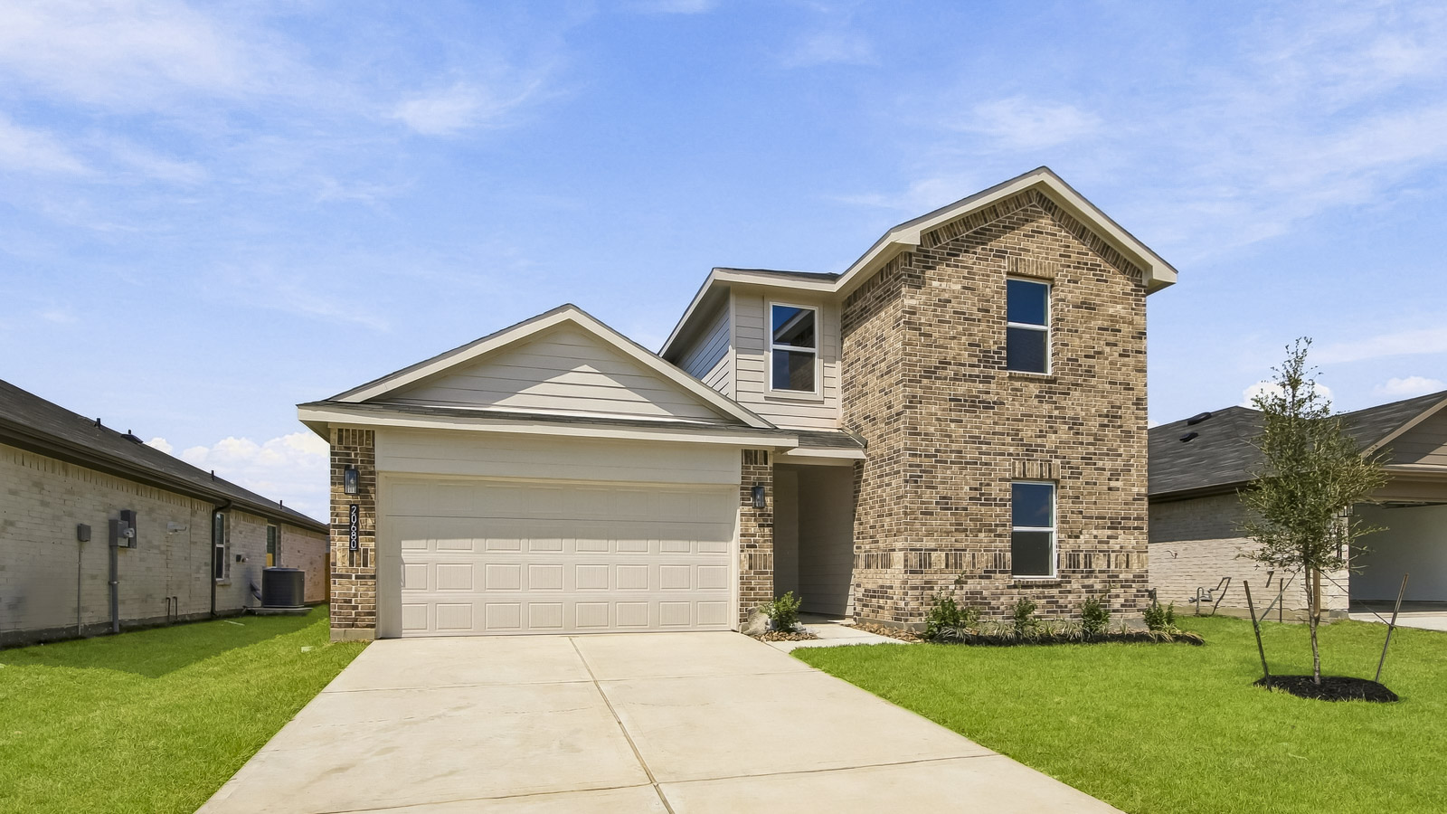 two story home with 2 car garage