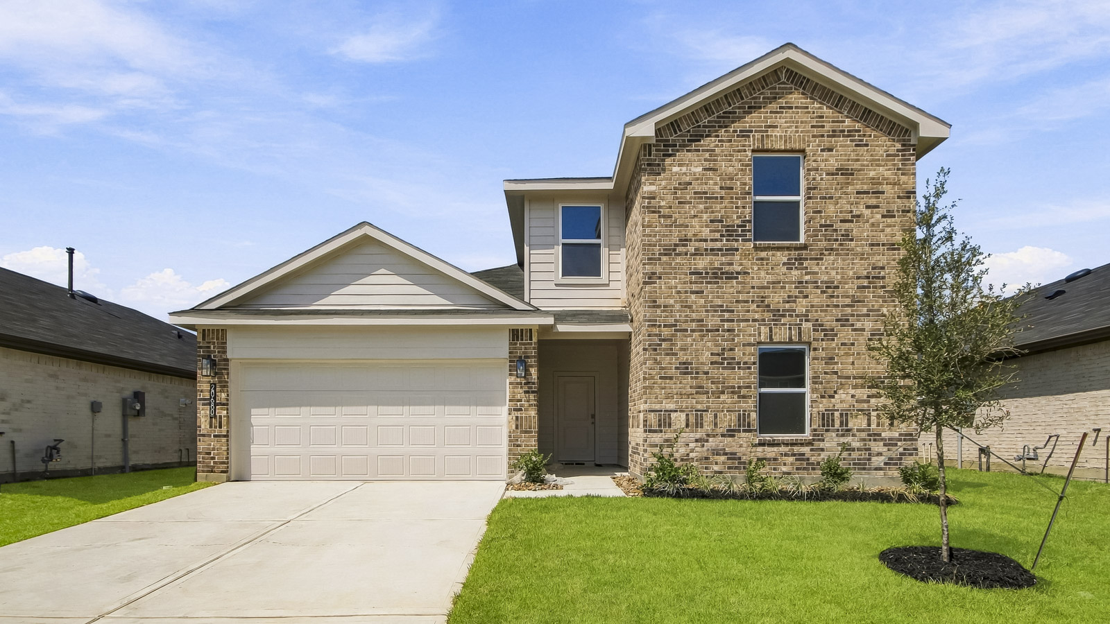 two story home with 2 car garage