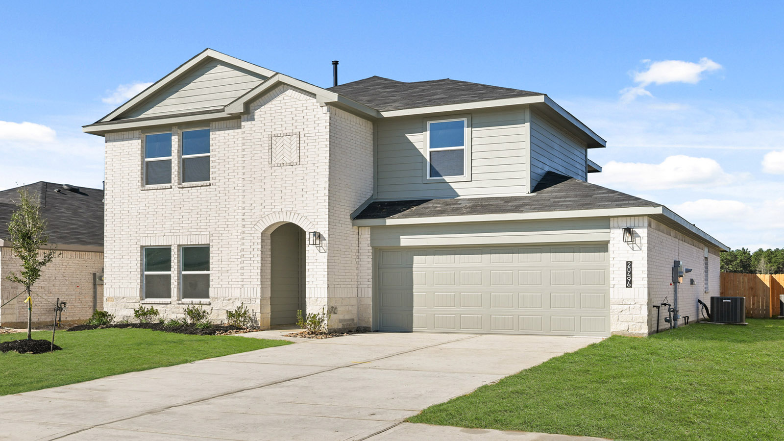 two story home with 2 car garage
