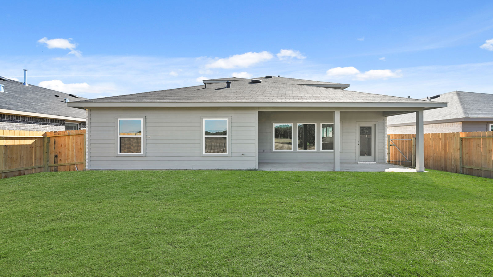covered patio with overhead lighting
