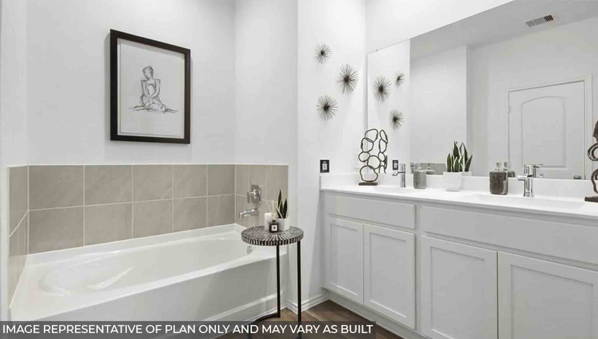 Primary bathroom with tub and shower