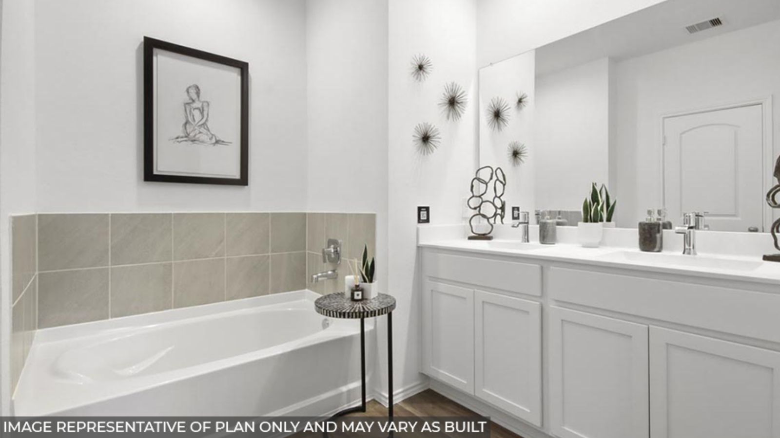 Primary bathroom with tub and shower
