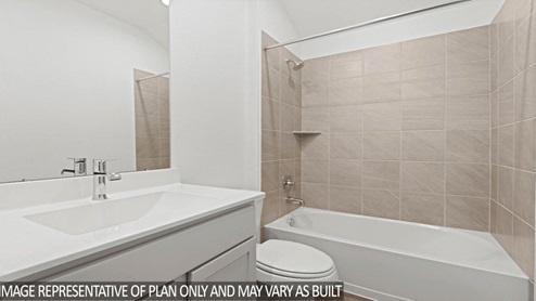 Secondary bathroom with large sink and tub shower