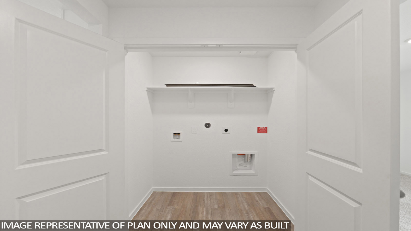 utility room with vinyl flooring