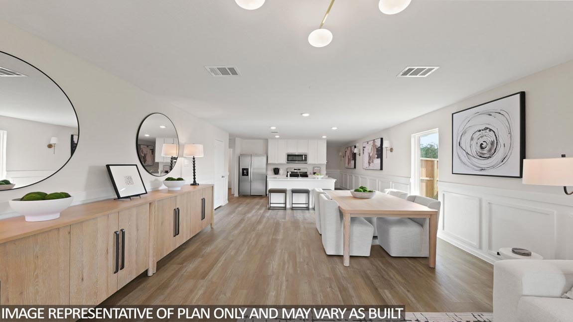 Spacious living area with vinyl flooring