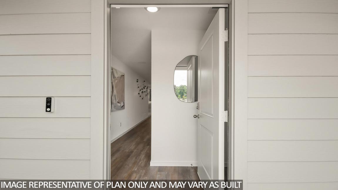 Entry hallway with vinyl flooring