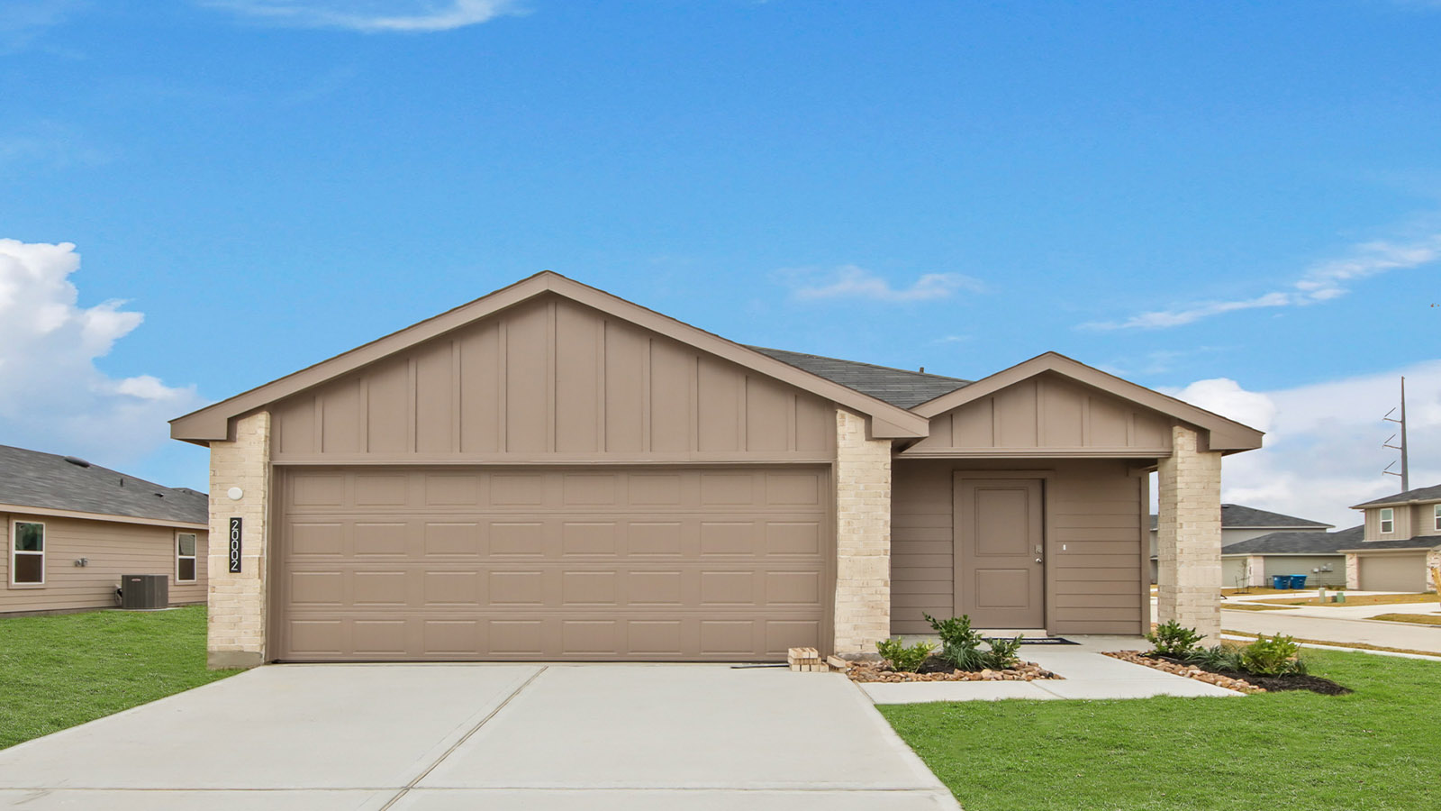 single story home with 2 car garage