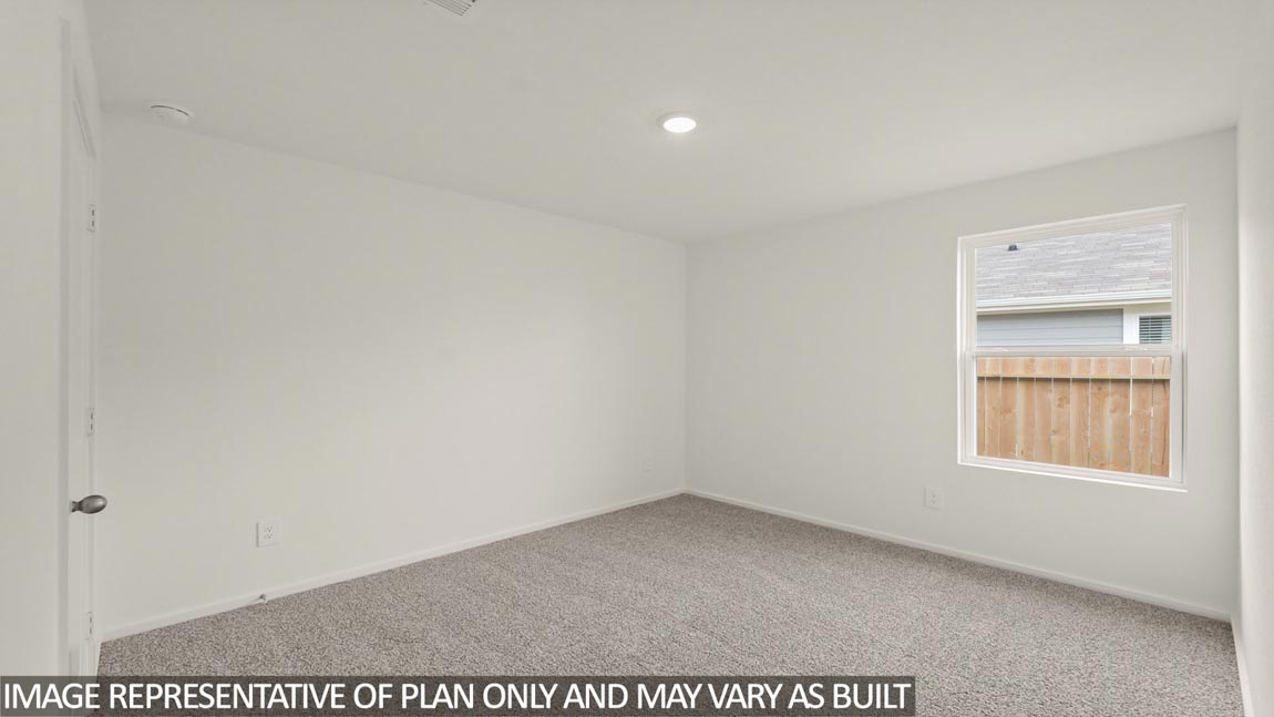 Secondary bedroom with bright window