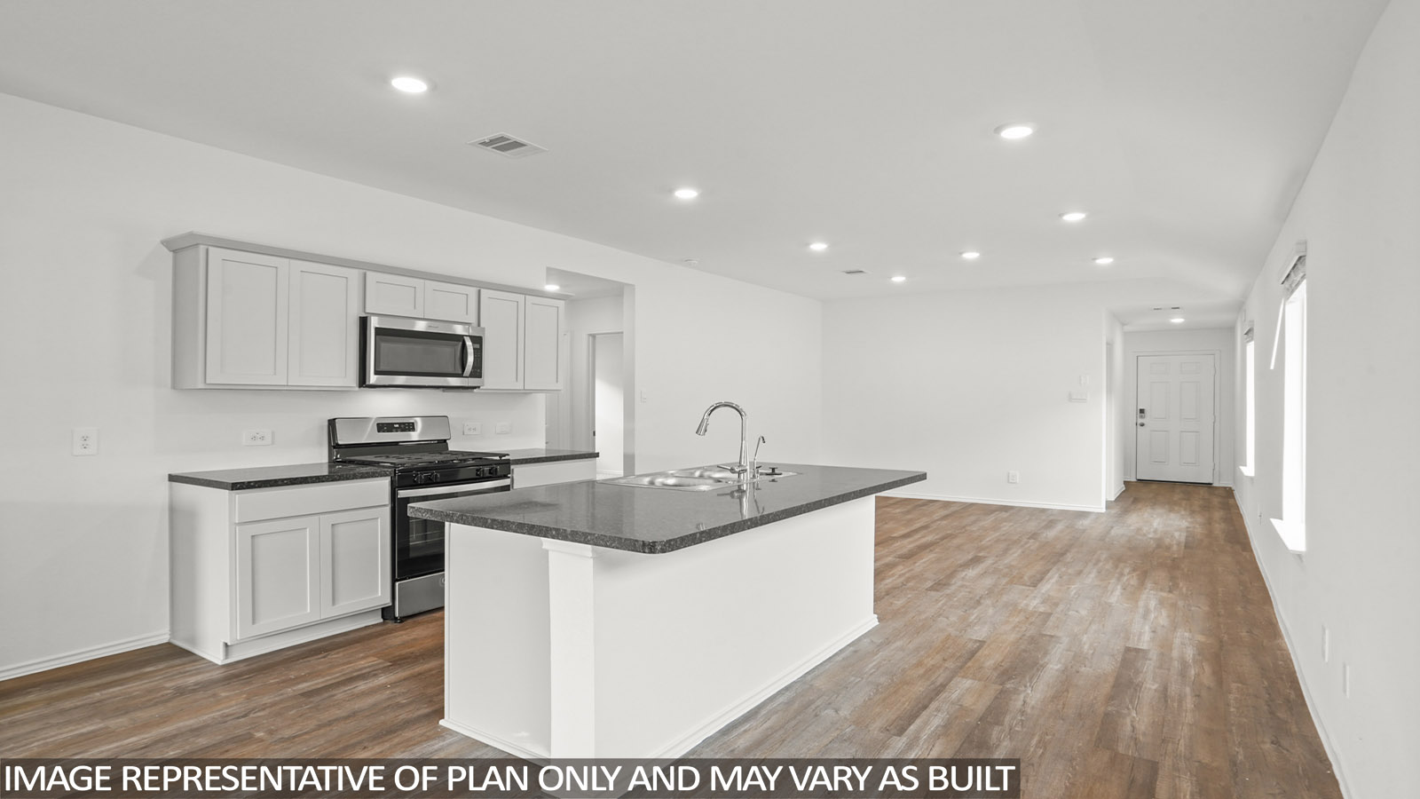 Kitchen with stainless-steel appliances.