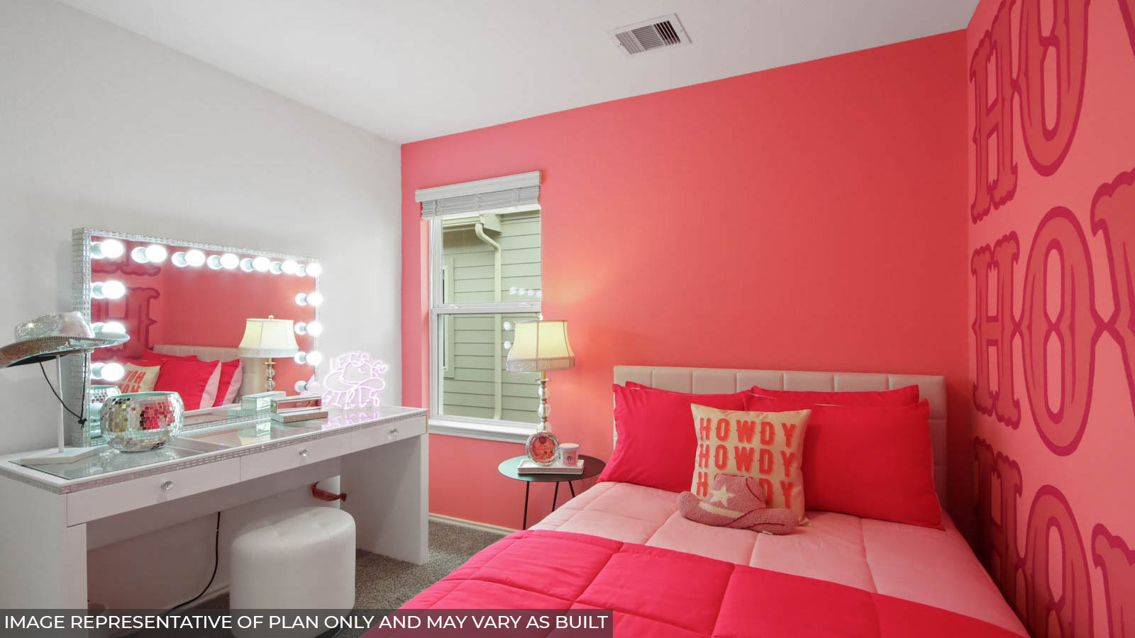 Secondary bedroom with carpet flooring and a bright window.