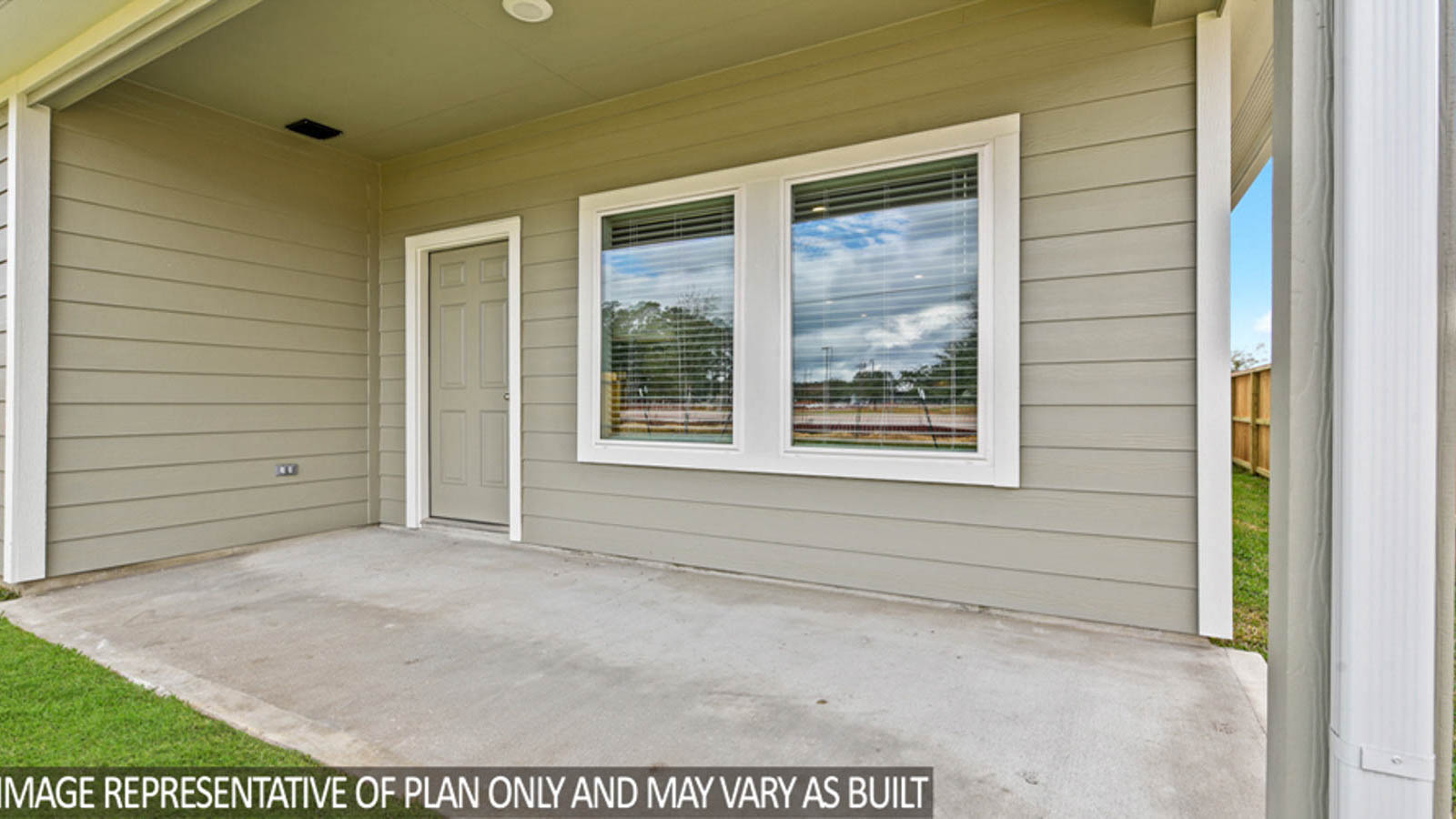 Backyard patio with overhead light.