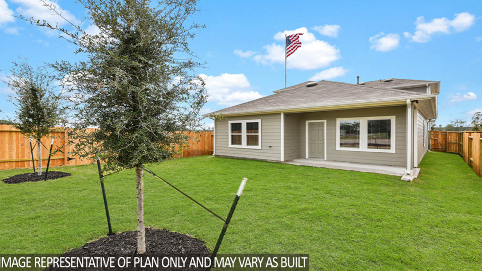 Spacious backyard with back patio.
