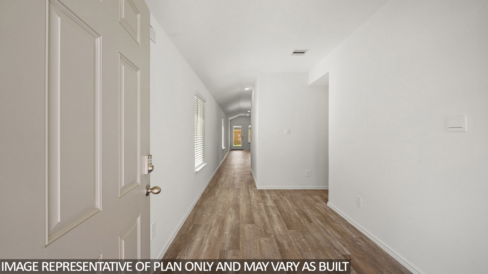 Entryway with vinyl flooring.