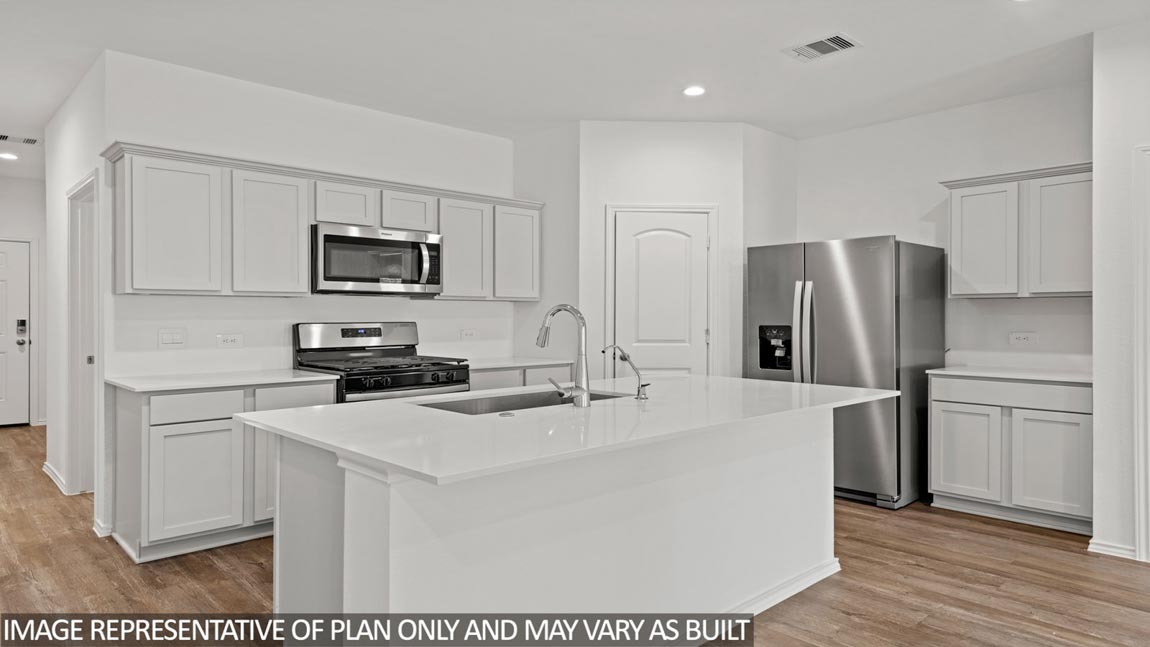 Open concept living, dining, and kitchen area