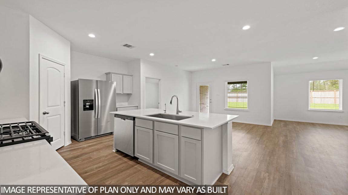 Open concept living, dining, and kitchen area