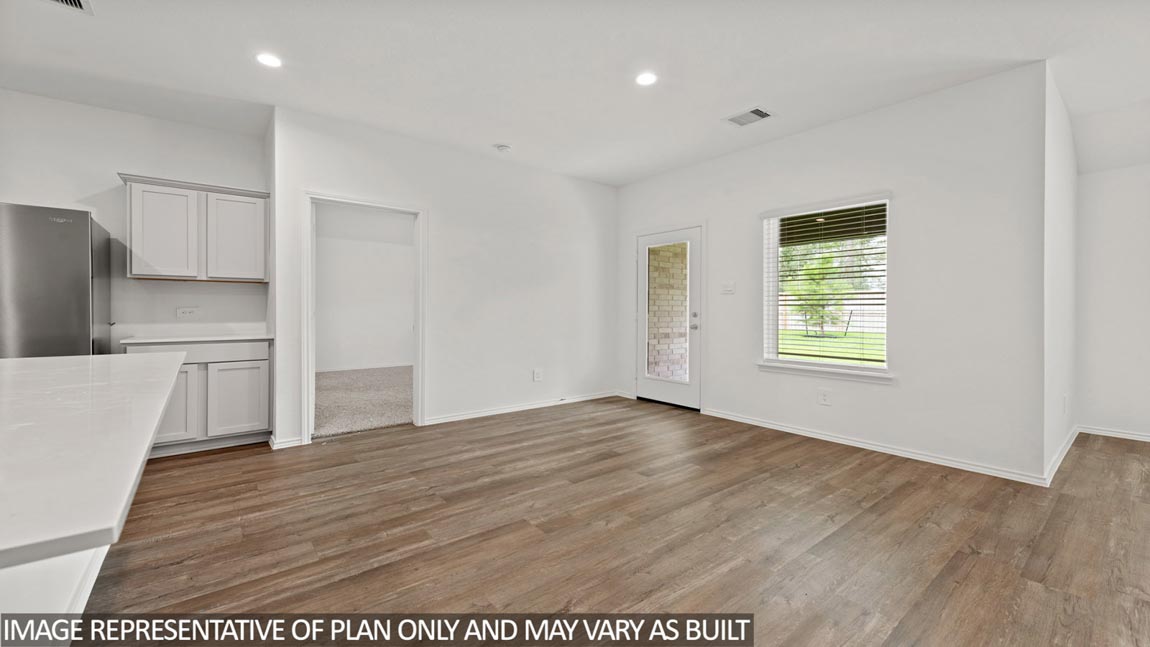 Open concept living, dining, and kitchen area