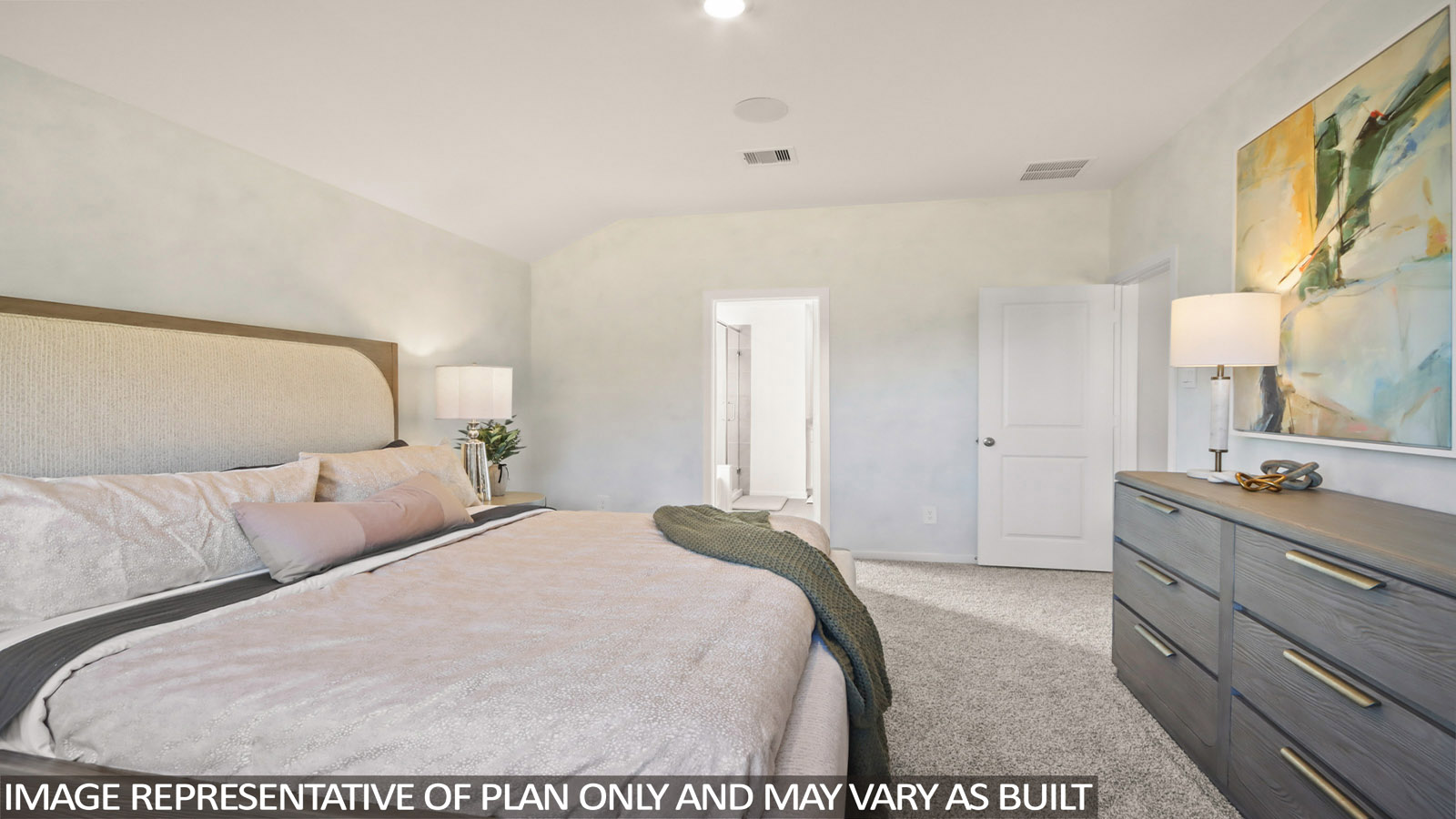 Primary bedroom with carpet flooring