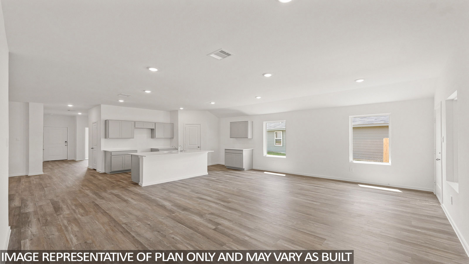 Open concept living, dining, and kitchen area