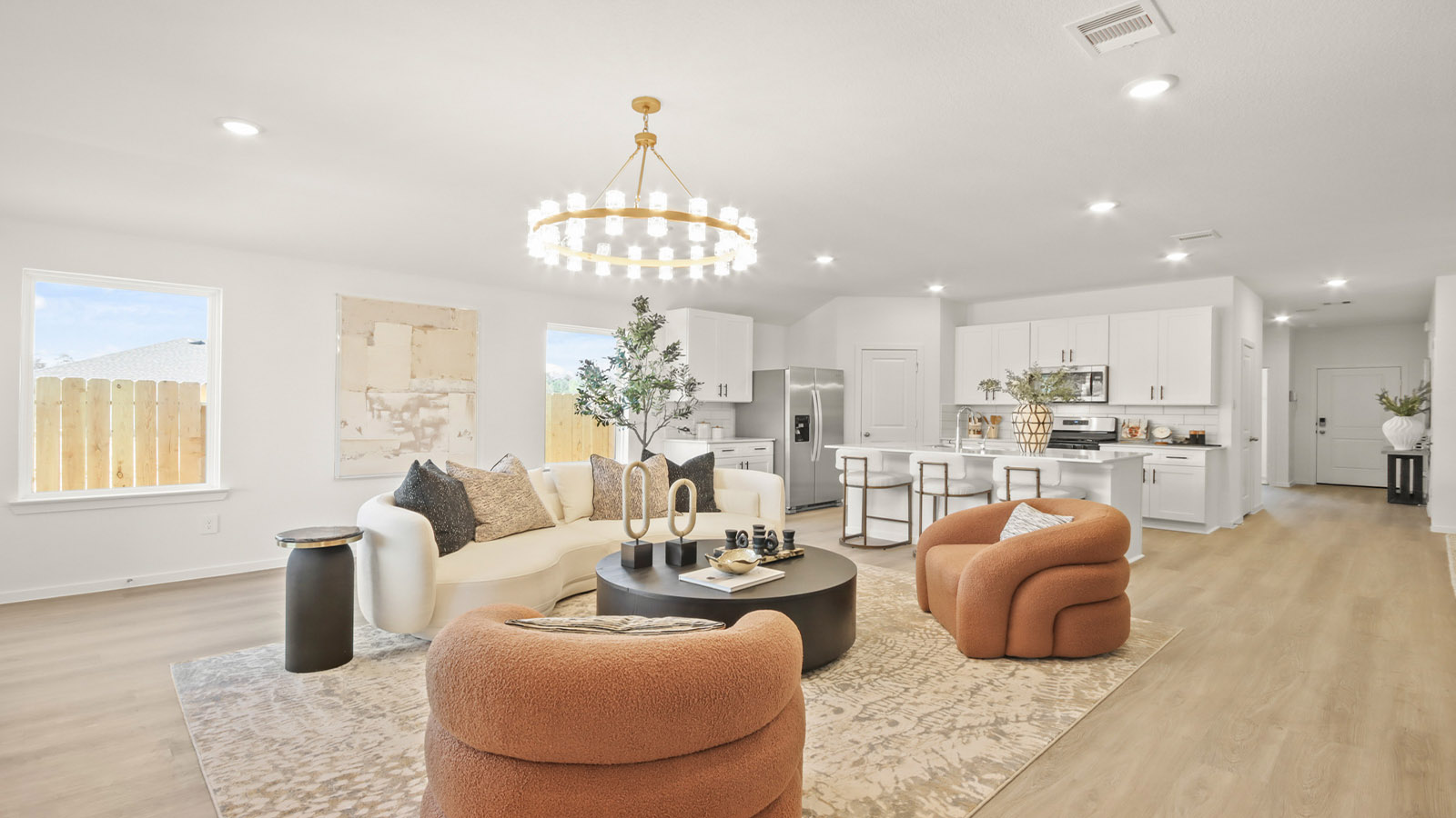 Open concept living, dining, and kitchen area