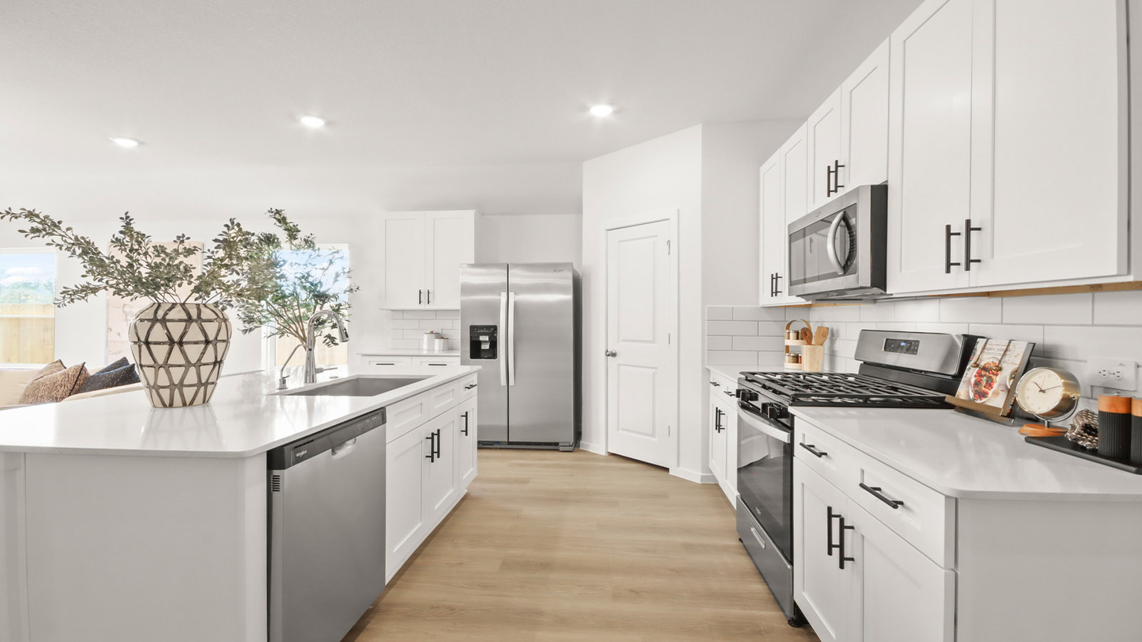 Open concept living, dining, and kitchen area