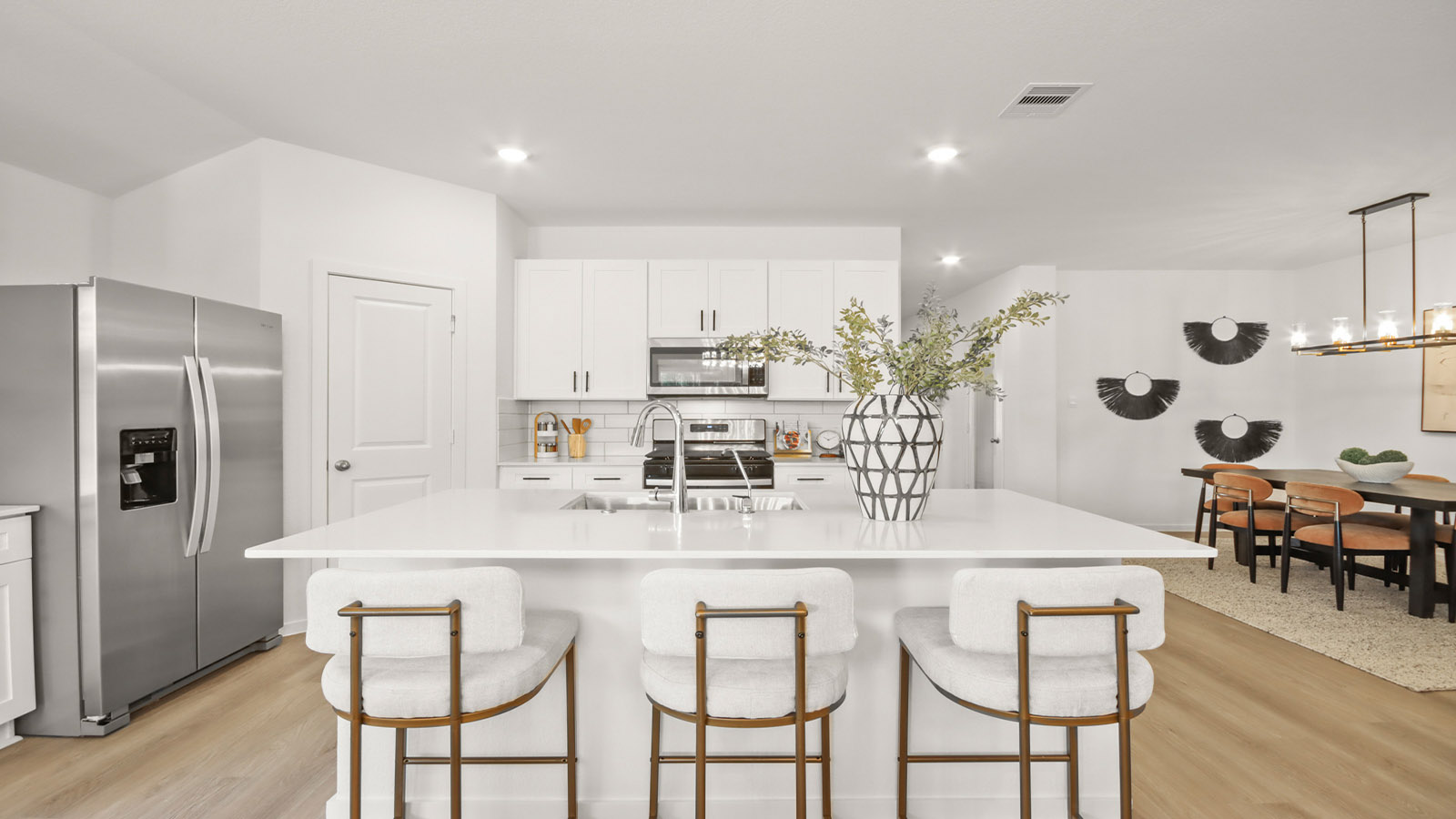 Open concept living, dining, and kitchen area