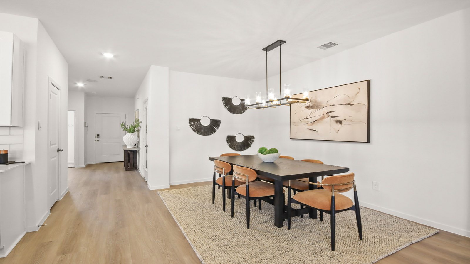 Open concept living, dining, and kitchen area