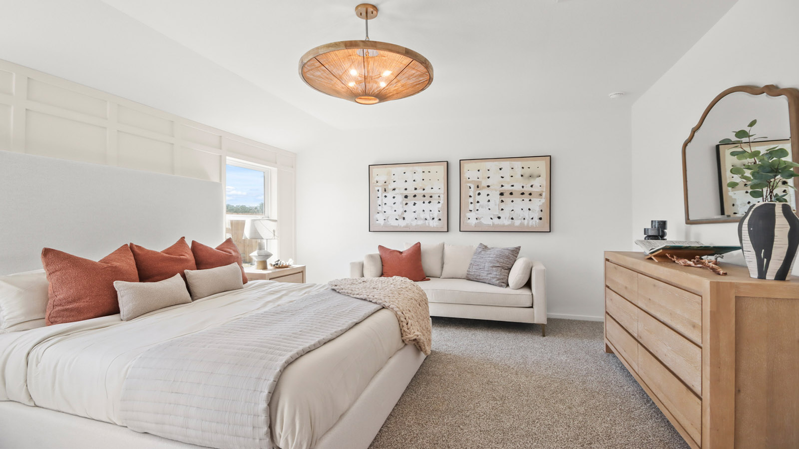Primary bedroom with carpet flooring