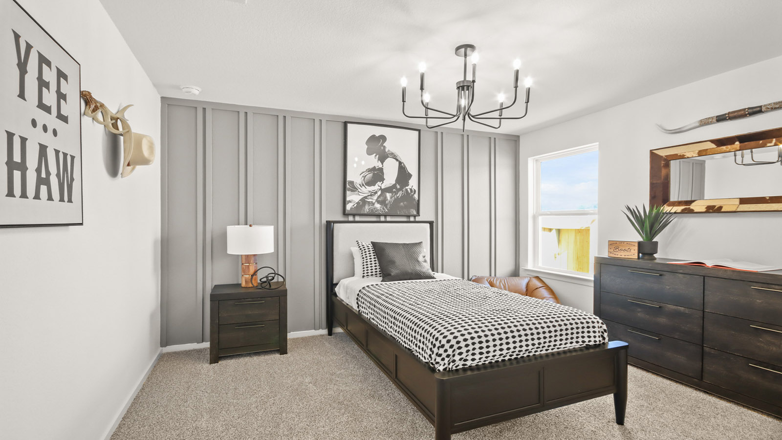 Secondary bedroom with carpet flooring