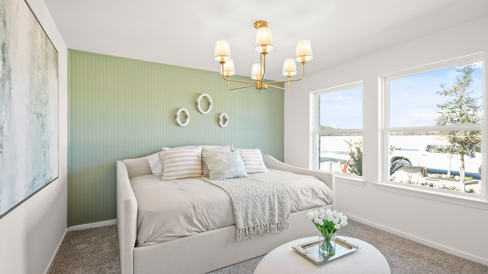 Secondary bedroom with carpet flooring