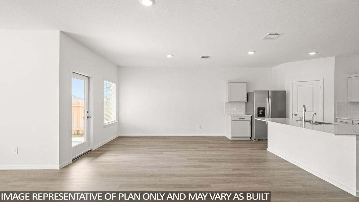 Open concept living, dining, and kitchen area