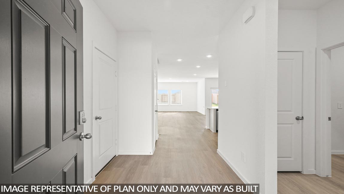 Entry hallway with vinyl flooring