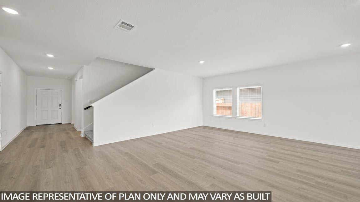 Open concept living, dining, and kitchen area