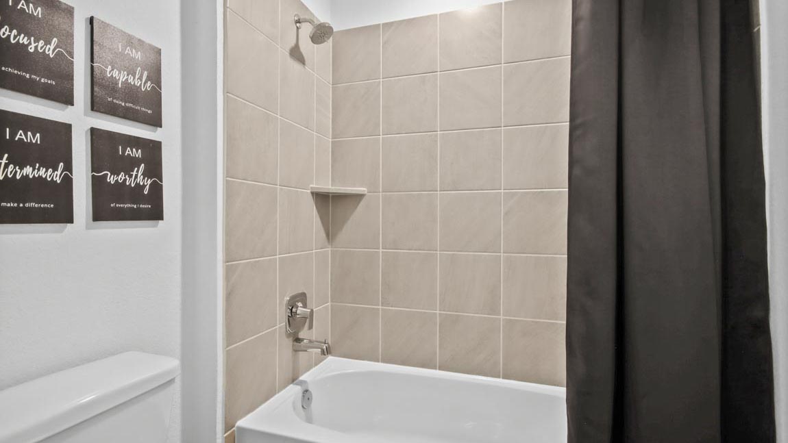 Secondary bathroom with tub/shower combo