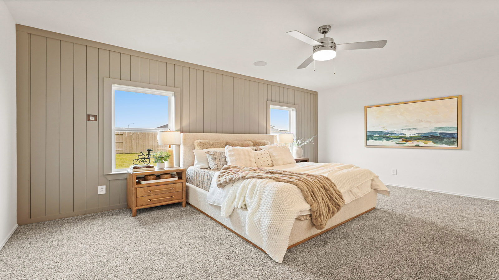 primary bedroom with carpet flooring