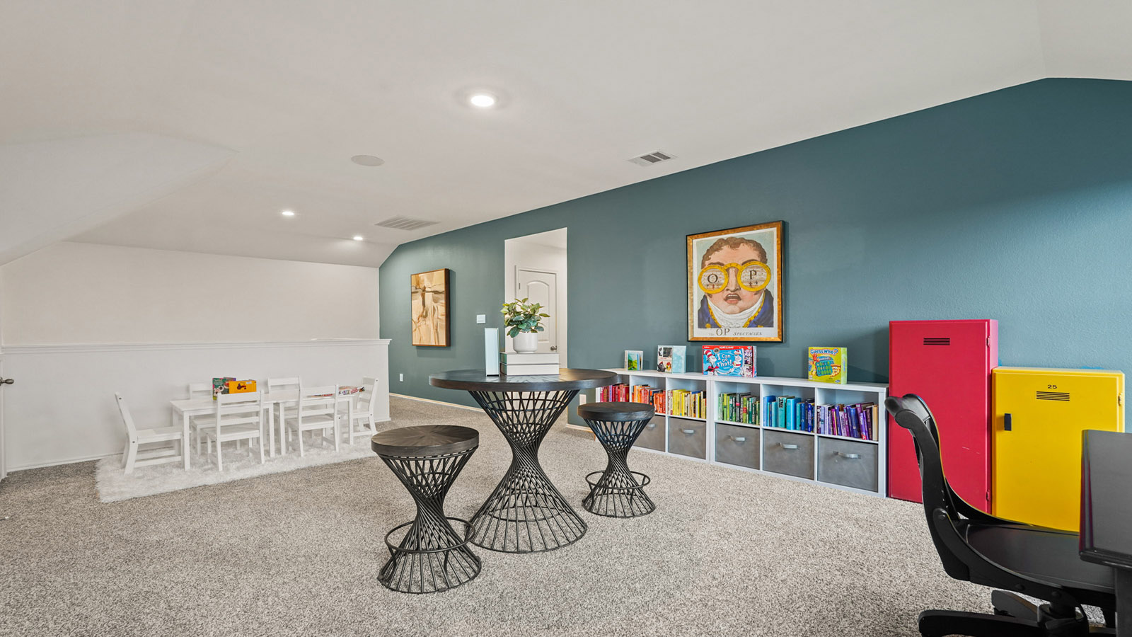 upstairs gameroom with carpet flooring