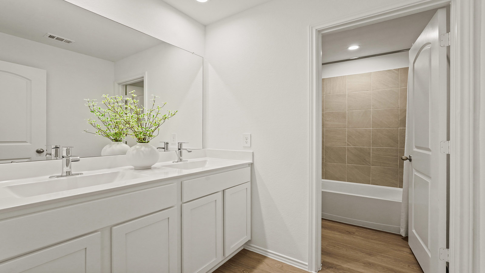 secondary bathroom with double sink