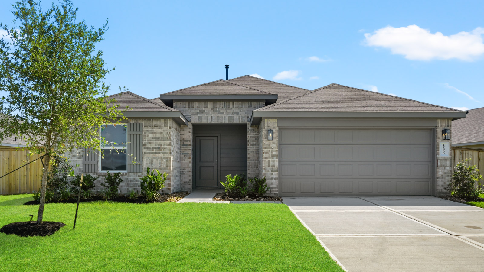 one story home with two car garage