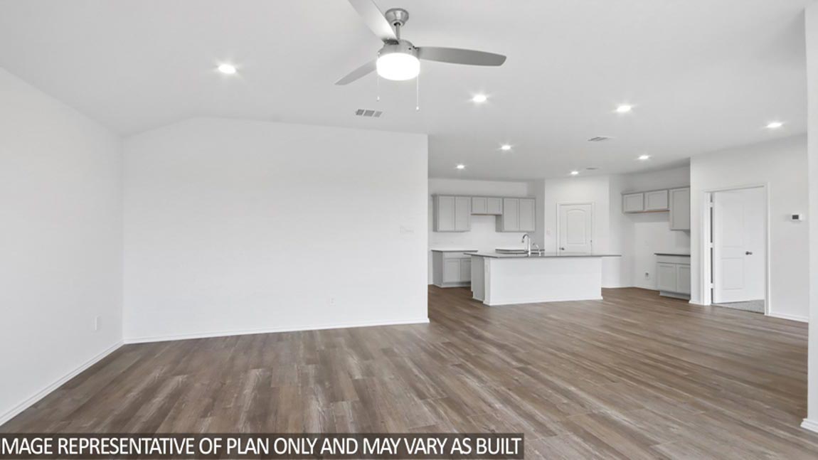 Open concept living, dining, and kitchen area