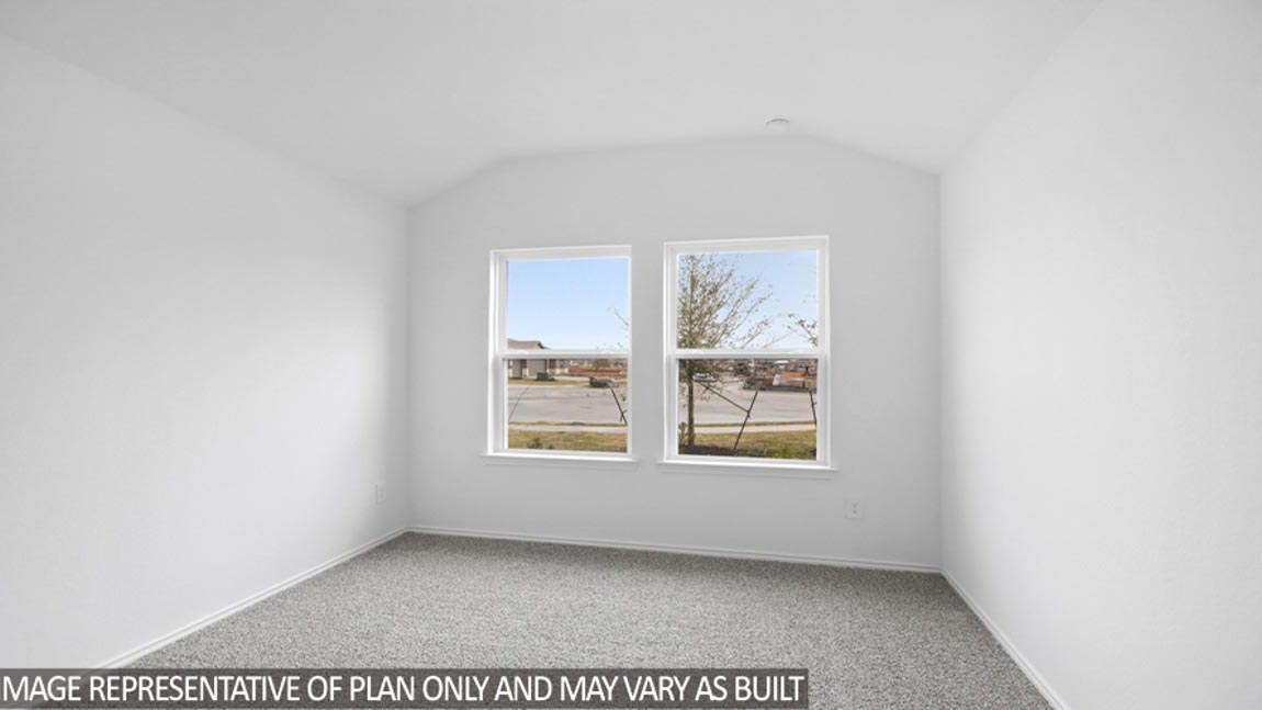 Secondary bedroom with bright window